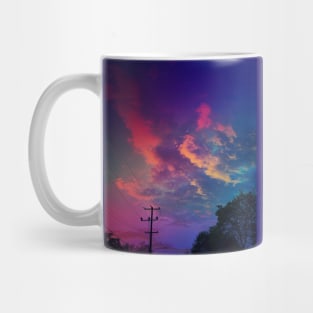 The sunset over the town Mug